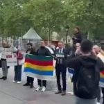 Penaberên Sûrî hatina Ehmed Şera ya Parîsê protesto kirin